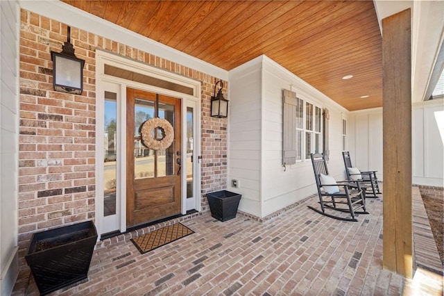 doorway to property with a porch