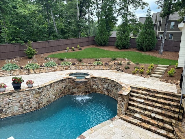 view of pool with an in ground hot tub