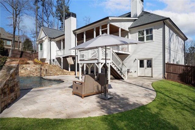 rear view of property with a patio area