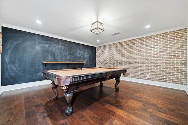 playroom featuring hardwood / wood-style flooring, crown molding, brick wall, and pool table