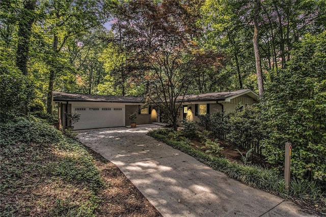 6590 Williamson Dr NE, Atlanta, GA 30328 - view of front of home with driveway and an attached garage