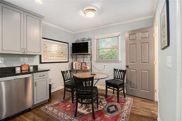 6590 Williamson Dr NE, Atlanta, GA 30328 - dining space with dark wood-style floors, baseboards, and crown molding