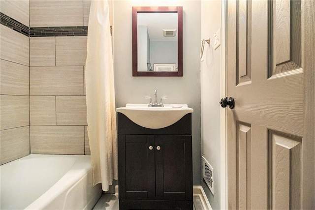 6590 Williamson Dr NE, Atlanta, GA 30328 - full bathroom featuring vanity and shower / bath combo with shower curtain