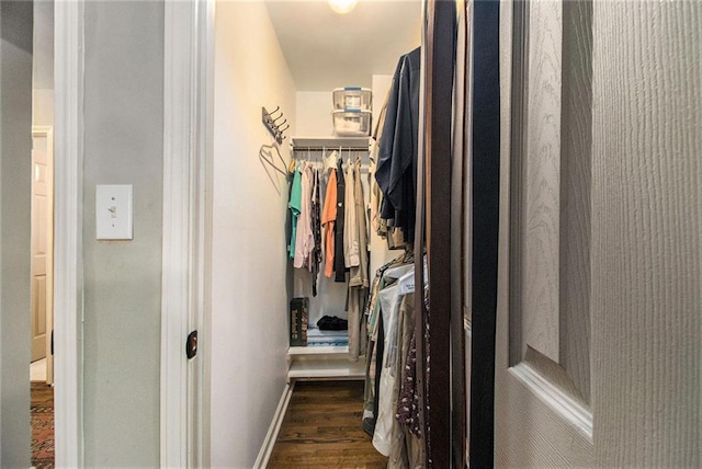 6590 Williamson Dr NE, Atlanta, GA 30328 - walk in closet with wood finished floors