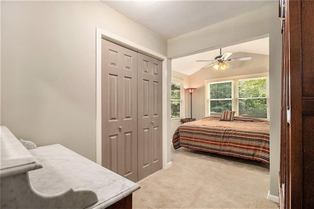 6590 Williamson Dr NE, Atlanta, GA 30328 - bedroom featuring carpet floors, lofted ceiling, a closet, a ceiling fan, and baseboards