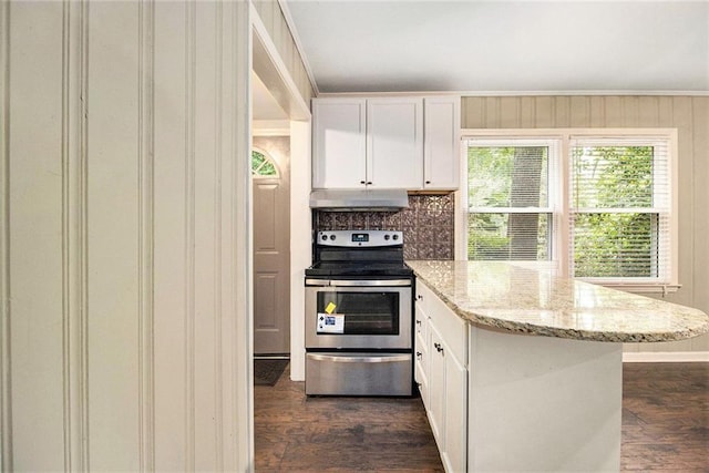 6590 Williamson Dr NE, Atlanta, GA 30328 - kitchen with stainless steel electric range, under cabinet range hood, dark wood-type flooring, and white cabinets