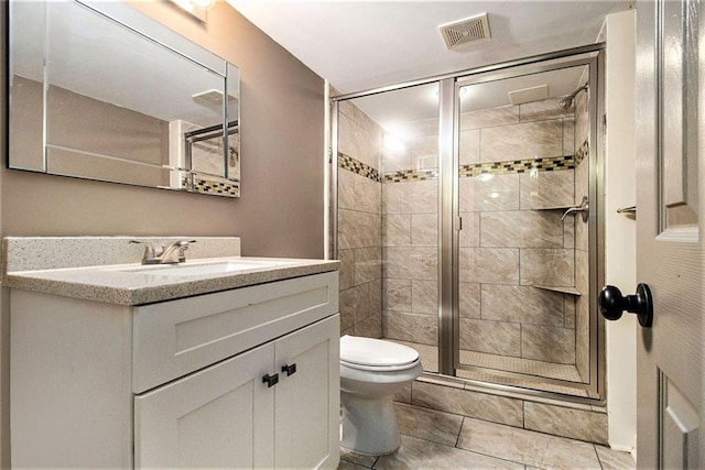 6590 Williamson Dr NE, Atlanta, GA 30328 - bathroom featuring a shower stall, vanity, and toilet