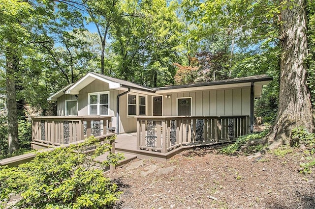 6590 Williamson Dr NE, Atlanta, GA 30328 - view of front facade with a wooden deck