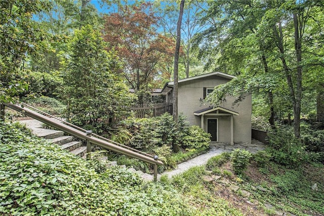 6590 Williamson Dr NE, Atlanta, GA 30328 - view of front of property featuring stairway and stucco siding