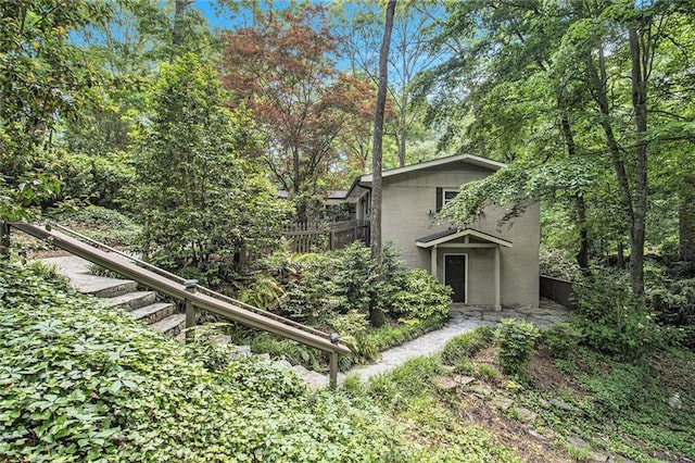 6590 Williamson Dr NE, Atlanta, GA 30328 - view of front of house featuring stairs and stucco siding