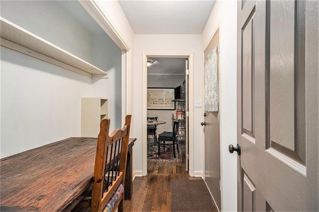 6590 Williamson Dr NE, Atlanta, GA 30328 - dining area featuring dark wood-type flooring and baseboards