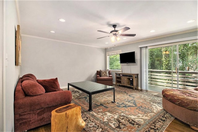 6590 Williamson Dr NE, Atlanta, GA 30328 - living room featuring ceiling fan, recessed lighting, ornamental molding, wood finished floors, and baseboards