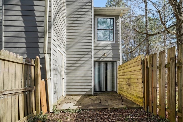 view of side of home featuring a patio