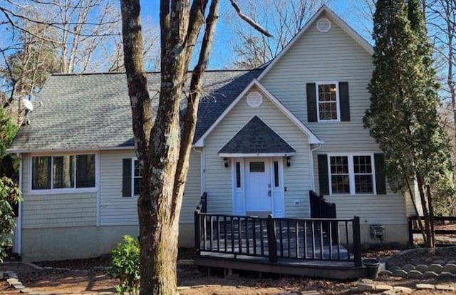 view of front of home with a wooden deck