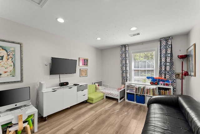 playroom featuring light wood-style floors and recessed lighting