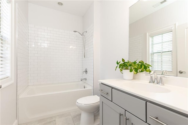 full bath featuring visible vents, toilet, shower / bathtub combination, tile patterned floors, and vanity