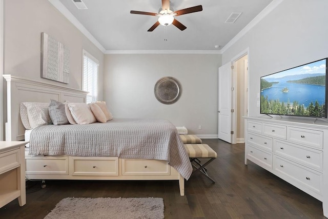 bedroom featuring ceiling fan, ornamental molding, and dark hardwood / wood-style floors