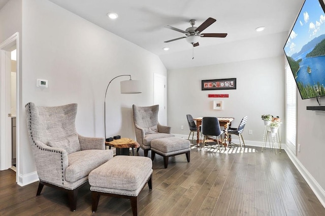 sitting room featuring ceiling fan, lofted ceiling, and wood-type flooring