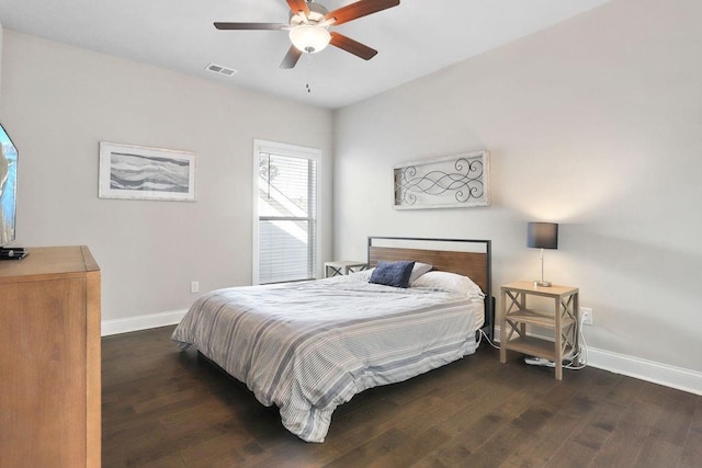 bedroom featuring dark wood-type flooring and ceiling fan