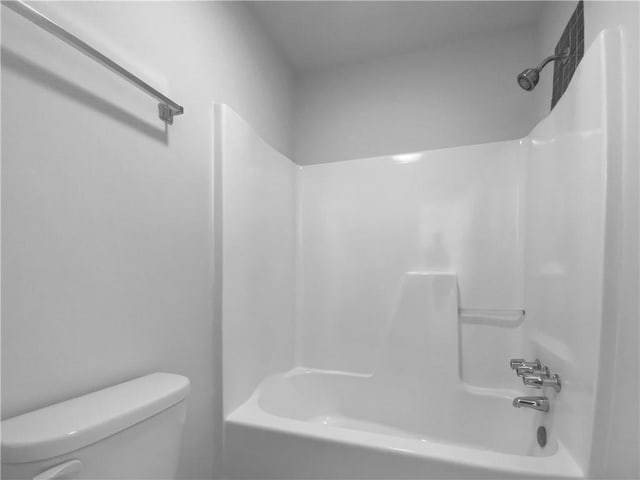 full bath with shower / tub combination and toilet