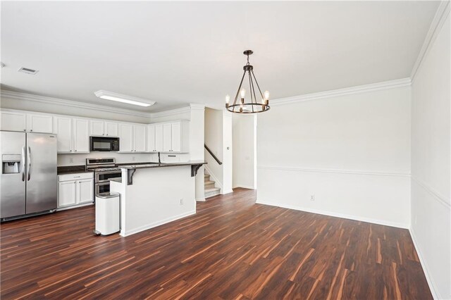 unfurnished dining area with baseboards, a notable chandelier, visible vents, and dark wood finished floors