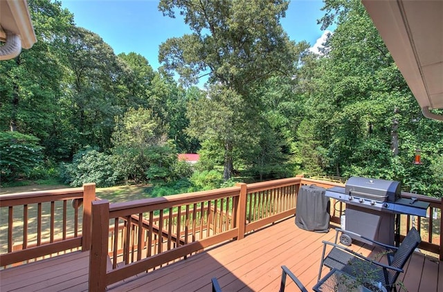 wooden terrace with area for grilling