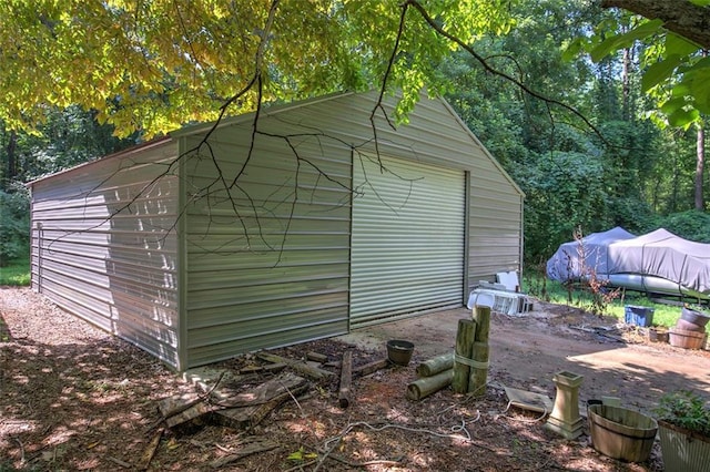 view of outbuilding with a garage