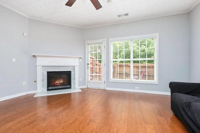 786 Brookside Parc Ln, Avondale Estates, GA 30002 - living room featuring ceiling fan, wood finished floors, ornamental molding, and a high end fireplace