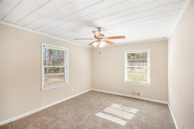 unfurnished room featuring light carpet, ceiling fan, ornamental molding, and wooden ceiling