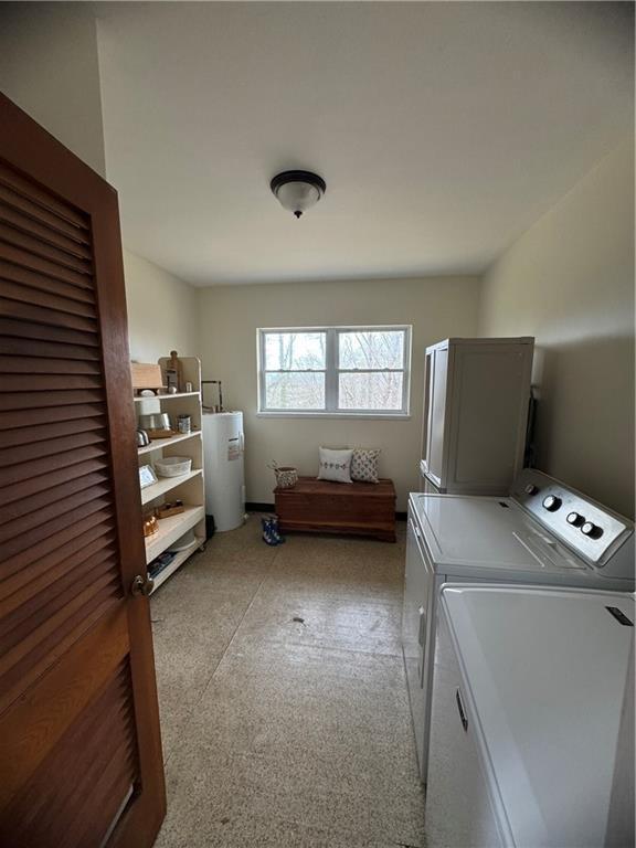 laundry area featuring laundry area and separate washer and dryer