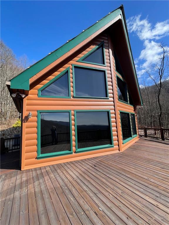 71 Hidden Valley Dr S, Ellijay, GA 30536 - view of side of home featuring a deck