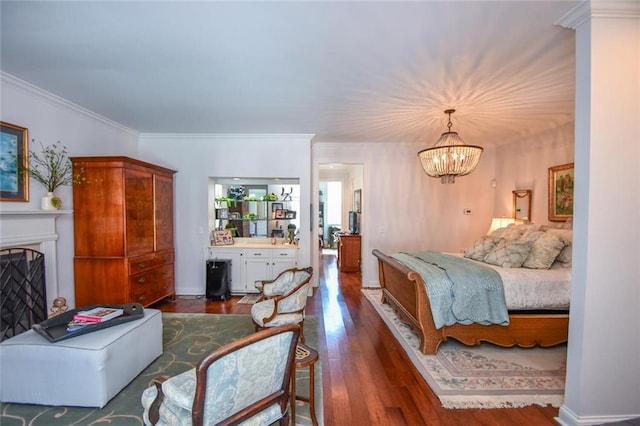 bedroom with an inviting chandelier, dark hardwood / wood-style floors, and ornamental molding