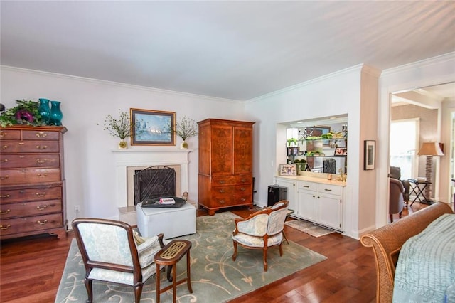 living room featuring crown molding and dark hardwood / wood-style floors