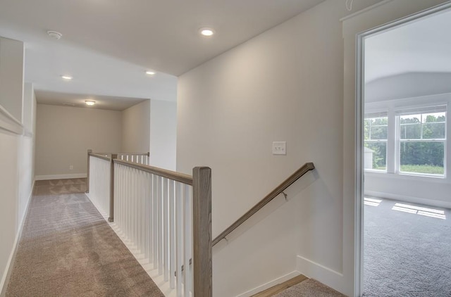 corridor with carpet floors