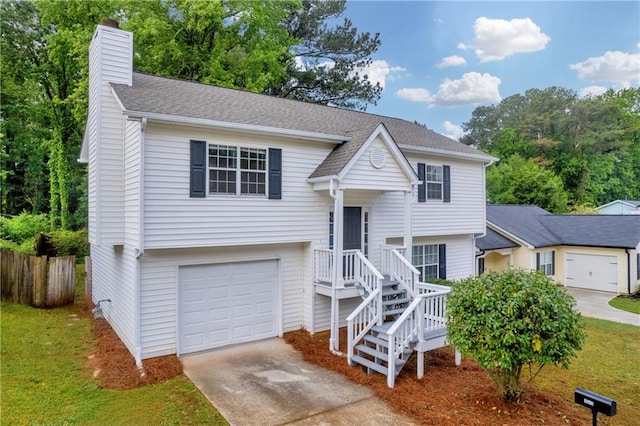 1645 Cobbs Creek Ln, Decatur, GA 30032 - raised ranch featuring driveway, a chimney, an attached garage, and roof with shingles