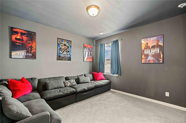 living room with carpet, visible vents, and baseboards