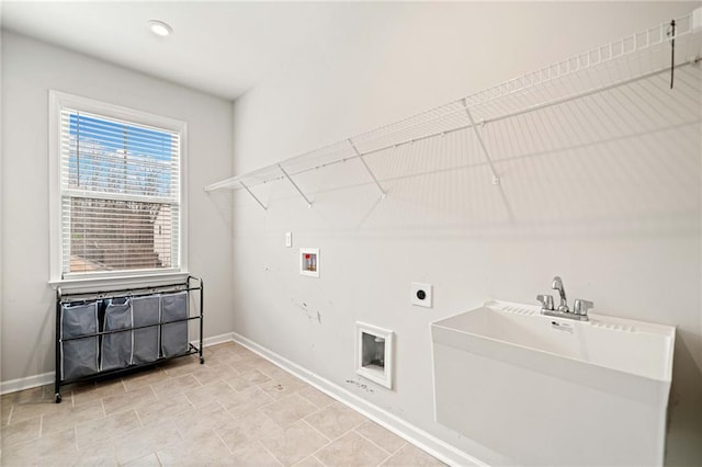 washroom featuring laundry area, hookup for a washing machine, baseboards, and hookup for an electric dryer