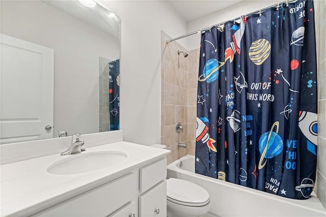 bathroom featuring shower / bath combination with curtain, vanity, and toilet