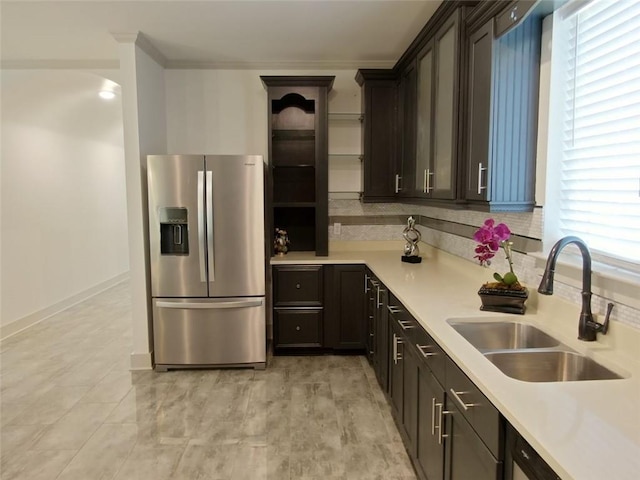 4590 River Stone Trl, Douglasville, GA 30135 - kitchen featuring stainless steel fridge, a sink, light countertops, open shelves, and tasteful backsplash