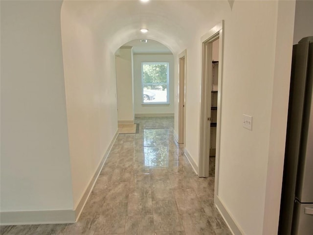4590 River Stone Trl, Douglasville, GA 30135 - hall featuring baseboards and arched walkways