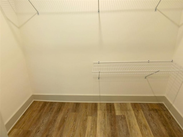 4590 River Stone Trl, Douglasville, GA 30135 - spacious closet featuring wood finished floors