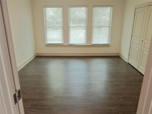 4590 River Stone Trl, Douglasville, GA 30135 - unfurnished room featuring dark wood-style floors and baseboards