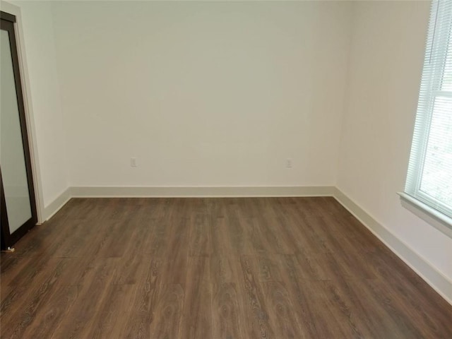 4590 River Stone Trl, Douglasville, GA 30135 - unfurnished room with dark wood-style floors and baseboards