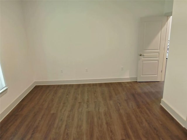 4590 River Stone Trl, Douglasville, GA 30135 - unfurnished room with baseboards and dark wood-style floors