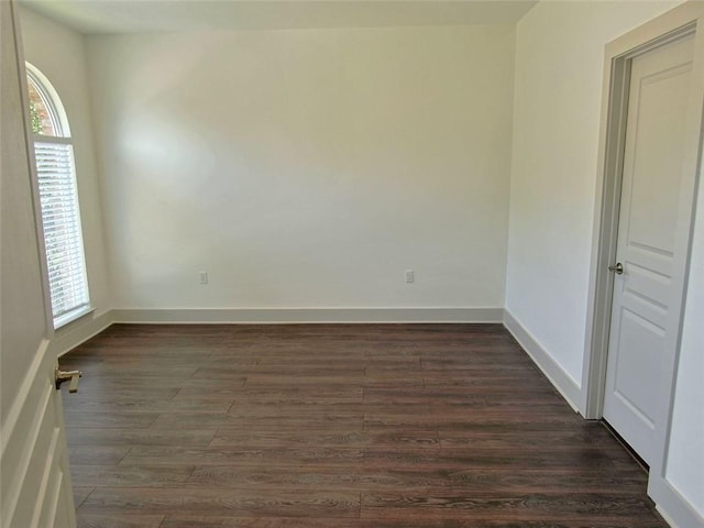 4590 River Stone Trl, Douglasville, GA 30135 - spare room featuring dark wood finished floors and baseboards