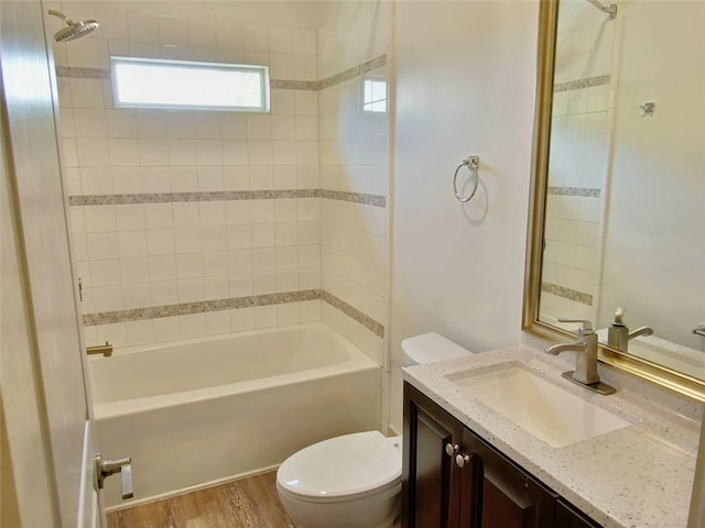 4590 River Stone Trl, Douglasville, GA 30135 - full bathroom featuring toilet, vanity, wood finished floors, and shower / bath combination