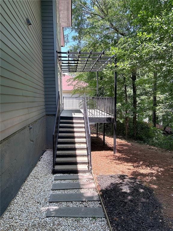4590 River Stone Trl, Douglasville, GA 30135 - view of yard with stairway, a pergola, and a wooden deck