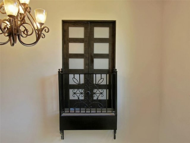 4590 River Stone Trl, Douglasville, GA 30135 - doorway featuring a chandelier