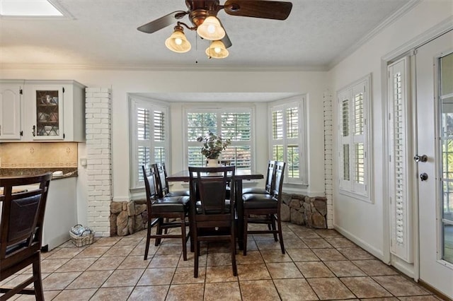 263 Mountainview Cir, Canton, GA 30115 - dining room with a textured ceiling, ornamental molding, ceiling fan, and light tile patterned flooring