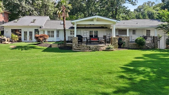 263 Mountainview Cir, Canton, GA 30115 - back of property featuring french doors, a lawn, and a patio area